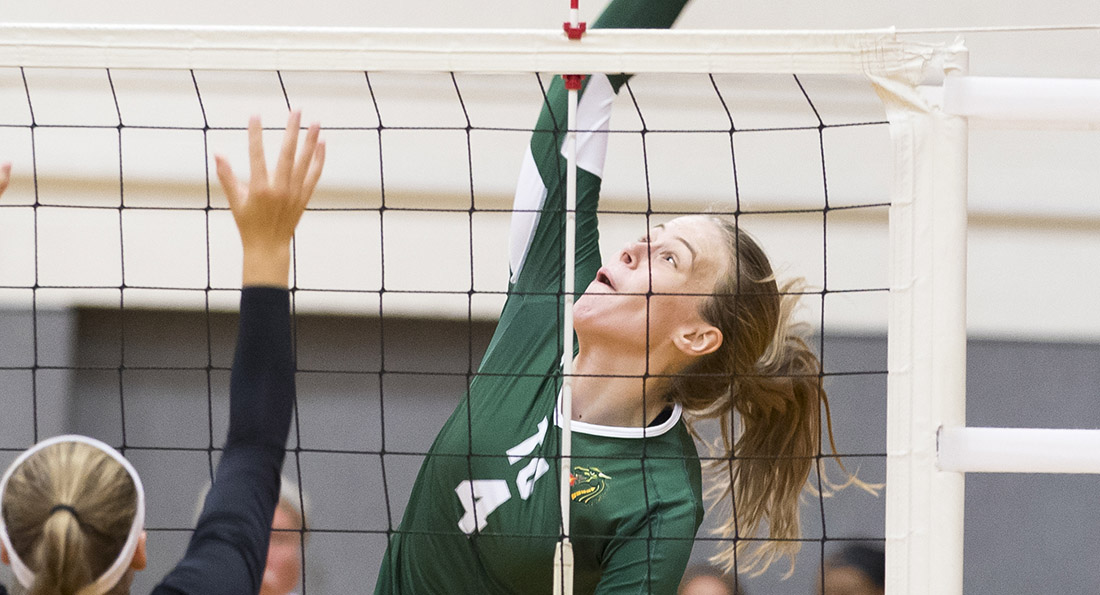 Jenna Huffman finished with 27 kills, two solo blocks, and 12 assisted blocks as the Dragons split on opening day.