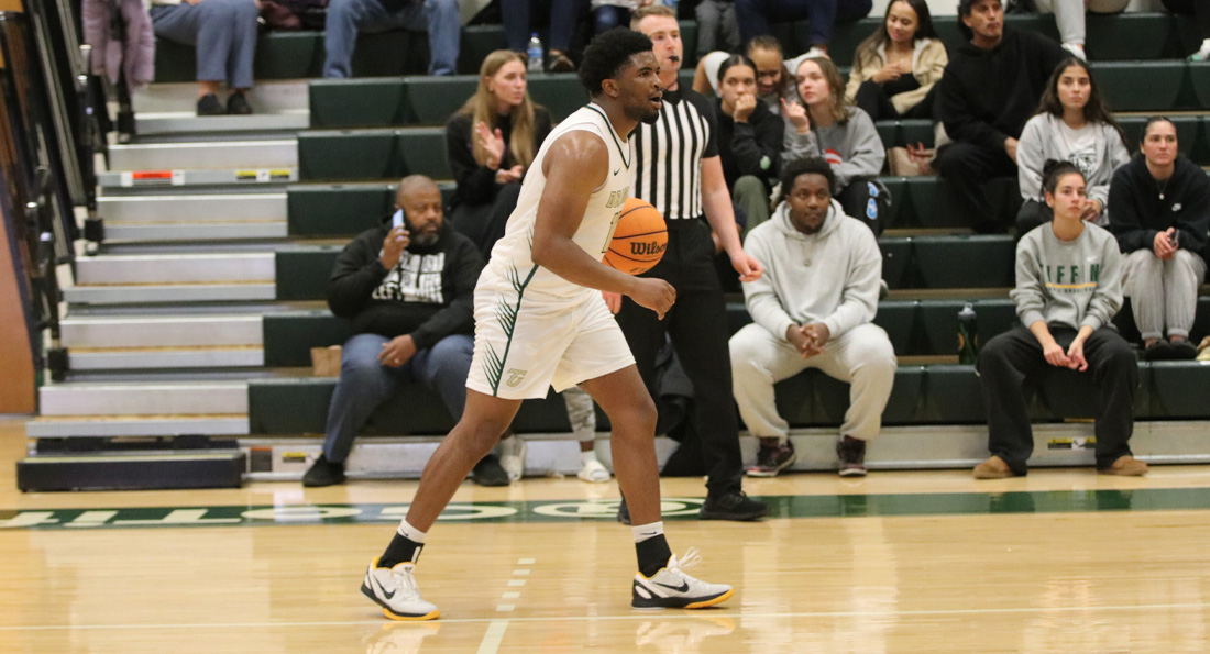 Carius Key leads the Dragons with 21 points in win over Bryant & Stratton.